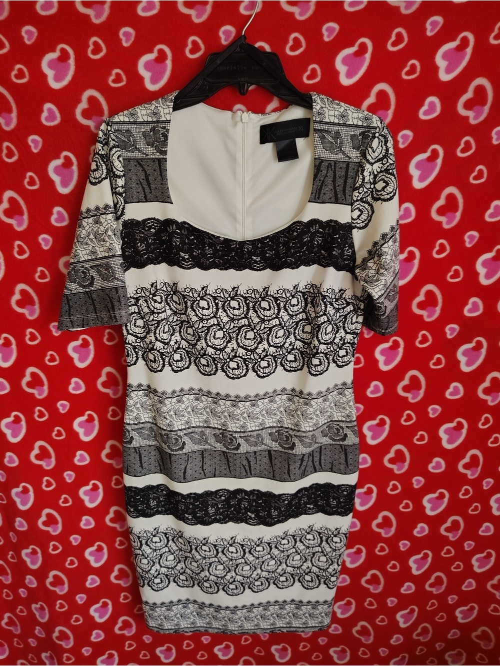 Kardashian Kollection Bodycon Dress featuring a black and white lace print